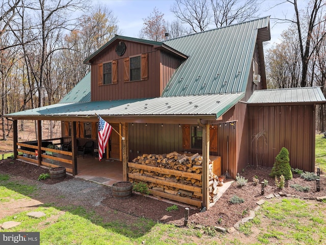 125 Rural Retreat Ln, Great Cacapon, WV 25422 - view of front facade with metal roof