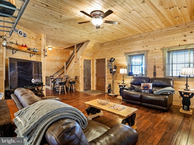 125 Rural Retreat Ln, Great Cacapon, WV 25422 - living area with wooden ceiling, wooden walls, hardwood / wood-style flooring, a ceiling fan, and vaulted ceiling