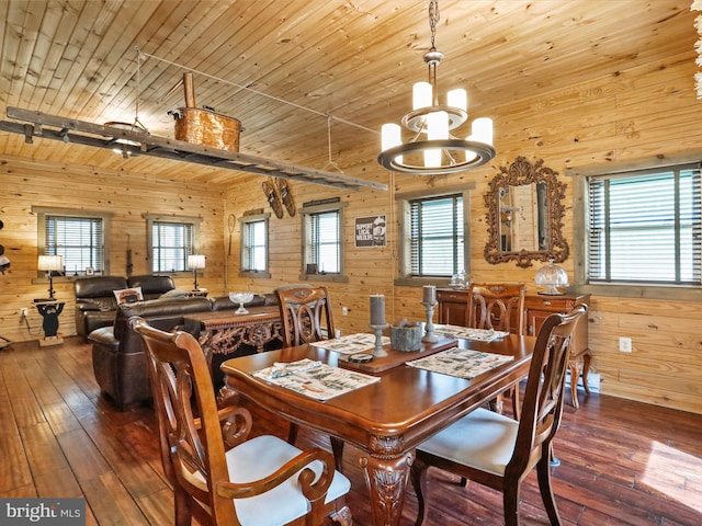 125 Rural Retreat Ln, Great Cacapon, WV 25422 - dining space with wood walls, hardwood / wood-style floors, wooden ceiling, a chandelier, and beamed ceiling