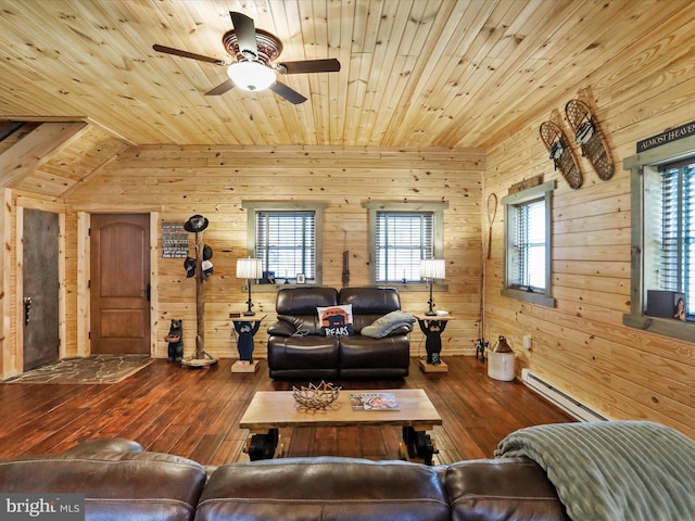 125 Rural Retreat Ln, Great Cacapon, WV 25422 - living area featuring a baseboard radiator, wood ceiling, hardwood / wood-style floors, wood walls, and a ceiling fan