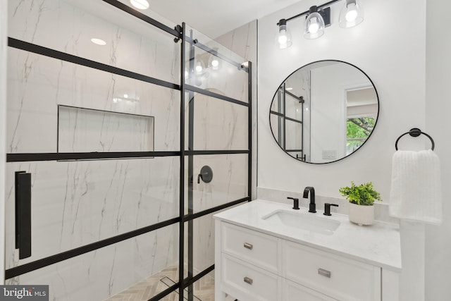 full bath featuring a shower stall and vanity