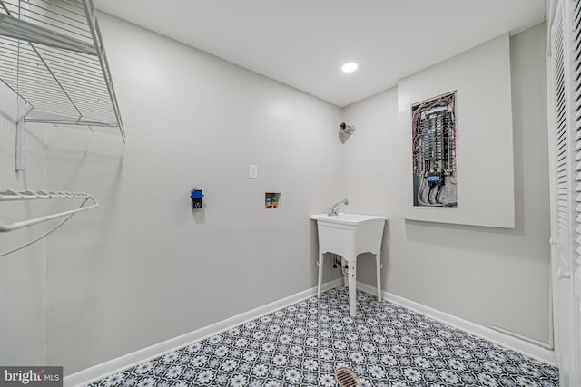 washroom featuring recessed lighting, laundry area, baseboards, and washer hookup