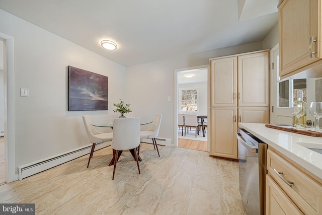 dining room featuring baseboard heating and a baseboard heating unit