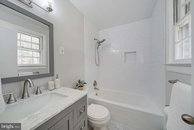 full bathroom featuring vanity, shower / bathing tub combination, and toilet