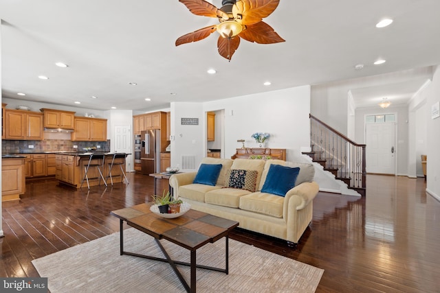 42364 Winsbury W Pl, Sterling, VA 20166 - living area featuring dark wood-style floors, stairs, a ceiling fan, and recessed lighting