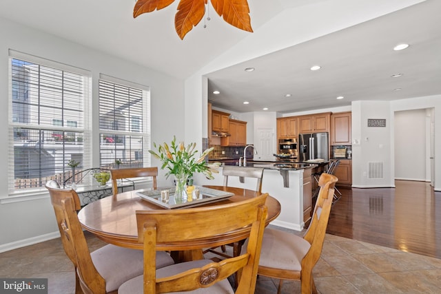 42364 Winsbury W Pl, Sterling, VA 20166 - dining space featuring recessed lighting, baseboards, and vaulted ceiling