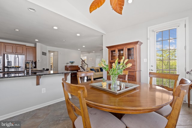 42364 Winsbury W Pl, Sterling, VA 20166 - dining room featuring recessed lighting, stairway, lofted ceiling, and baseboards
