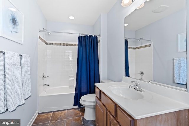 42364 Winsbury W Pl, Sterling, VA 20166 - bathroom featuring toilet, shower / bath combo, vanity, and baseboards