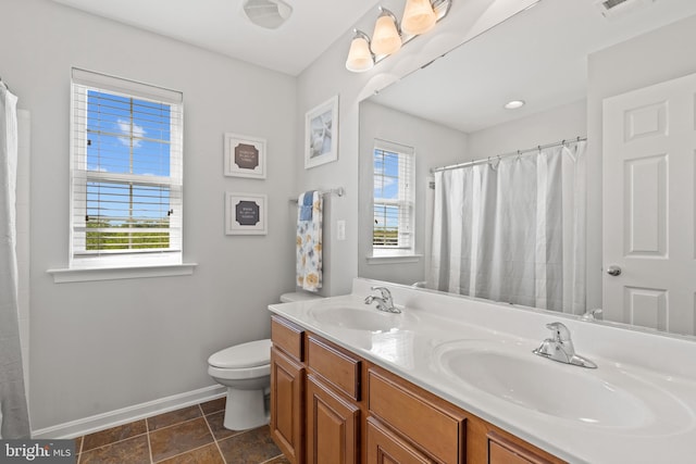 42364 Winsbury W Pl, Sterling, VA 20166 - full bathroom with baseboards, toilet, double vanity, and a shower with curtain