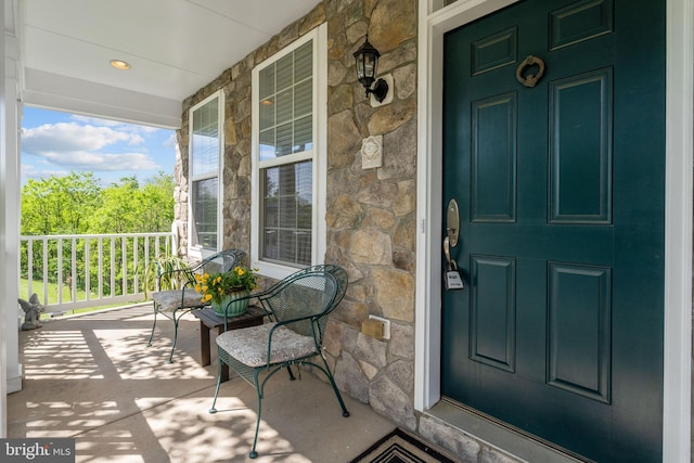 42364 Winsbury W Pl, Sterling, VA 20166 - property entrance with stone siding and a porch
