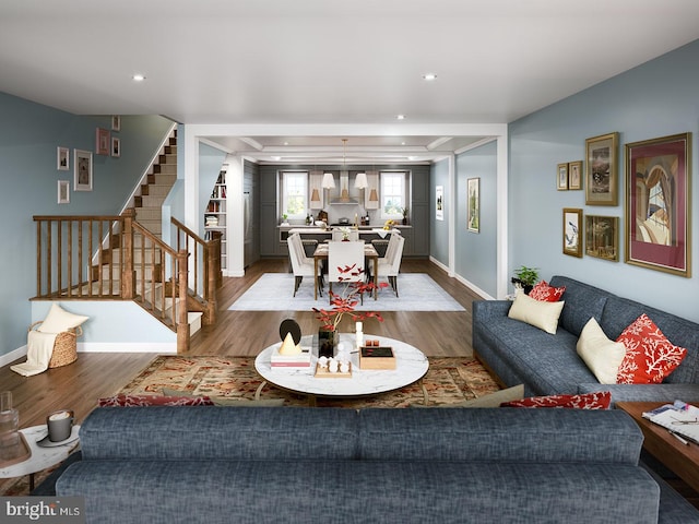 living room with recessed lighting, stairs, baseboards, and wood finished floors