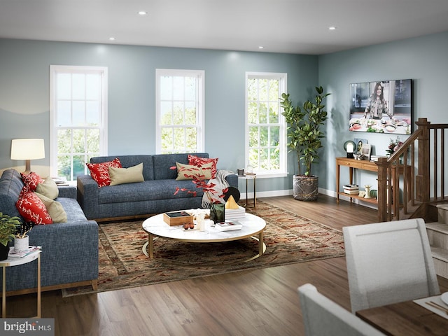 living area featuring baseboards, recessed lighting, and wood finished floors