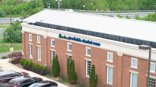 exterior space featuring uncovered parking