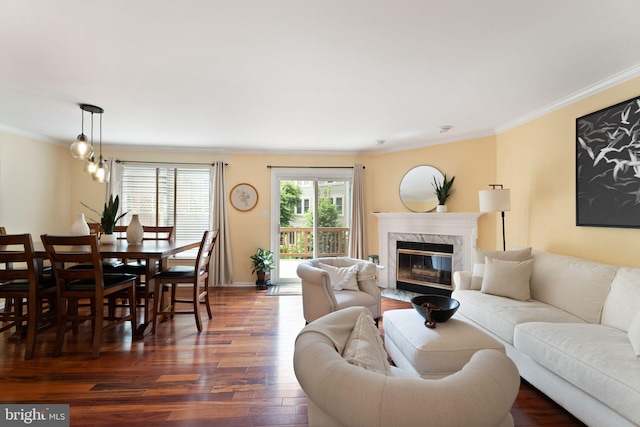 12015 Johns Pl, Fairfax, VA 22033 - living room featuring dark wood-type flooring, crown molding, a high end fireplace, and baseboards