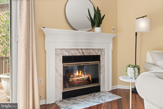 12015 Johns Pl, Fairfax, VA 22033 - detailed view of a premium fireplace, wood finished floors, and baseboards