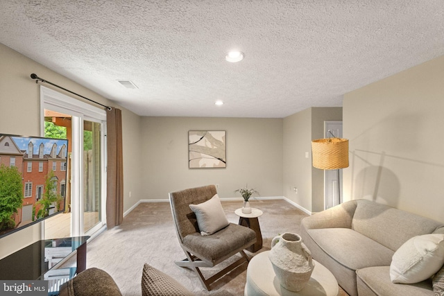 12015 Johns Pl, Fairfax, VA 22033 - living area featuring light carpet, baseboards, a textured ceiling, and recessed lighting