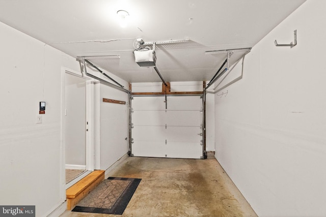 12015 Johns Pl, Fairfax, VA 22033 - garage featuring a garage door opener