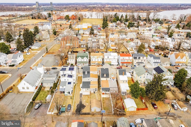 birds eye view of property with a residential view
