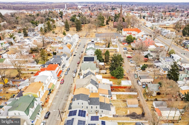 birds eye view of property with a residential view