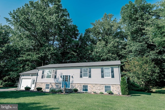 97 Winding Creek Rd, Stafford, VA 22554 - raised ranch with a front yard, an attached garage, and stone siding