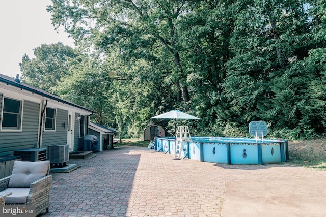 97 Winding Creek Rd, Stafford, VA 22554 - outdoor pool featuring a patio and cooling unit