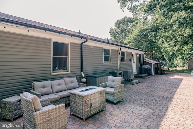 97 Winding Creek Rd, Stafford, VA 22554 - view of patio featuring area for grilling, an outdoor living space with a fire pit, and cooling unit