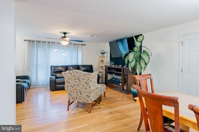 97 Winding Creek Rd, Stafford, VA 22554 - dining room with light wood finished floors and ceiling fan