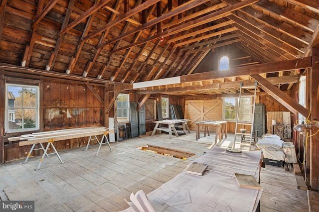 attic featuring a wealth of natural light