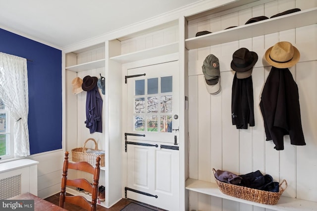 mudroom featuring crown molding