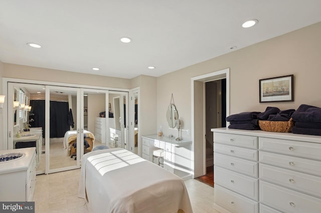 bedroom with french doors and recessed lighting