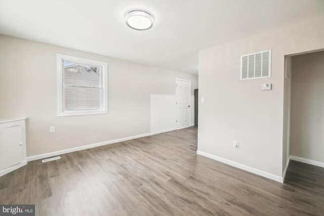 914 Andrews Rd, Glen Burnie, MD 21060 - unfurnished room featuring wood finished floors and baseboards