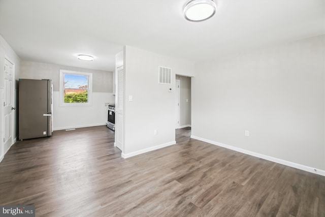 914 Andrews Rd, Glen Burnie, MD 21060 - spare room featuring dark wood finished floors and baseboards