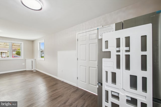 914 Andrews Rd, Glen Burnie, MD 21060 - empty room with dark wood-type flooring and baseboards