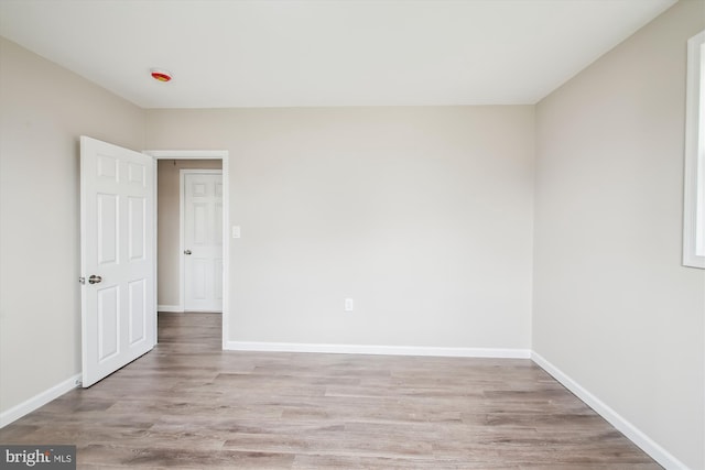 914 Andrews Rd, Glen Burnie, MD 21060 - spare room featuring light wood-style flooring and baseboards