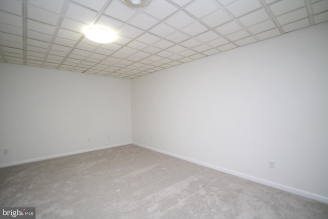 spare room with carpet floors and baseboards