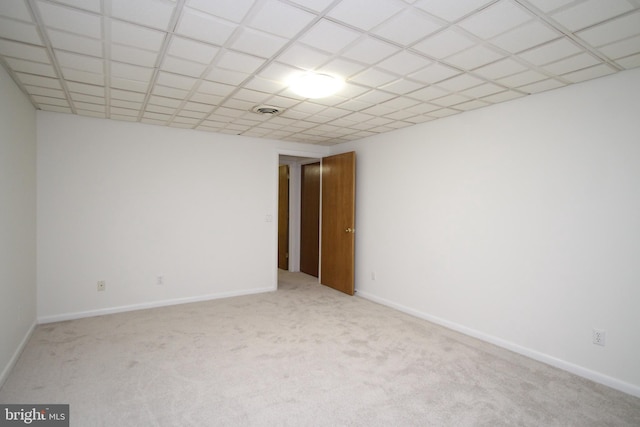 unfurnished room with carpet floors and baseboards