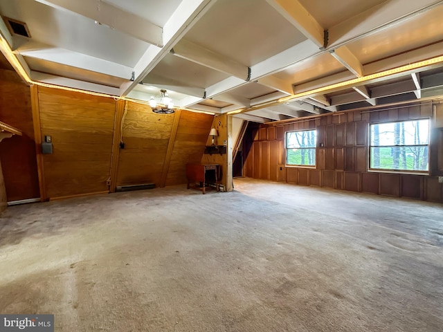 miscellaneous room featuring wooden walls, carpet flooring, and coffered ceiling