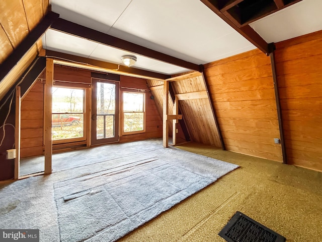 unfinished attic featuring visible vents