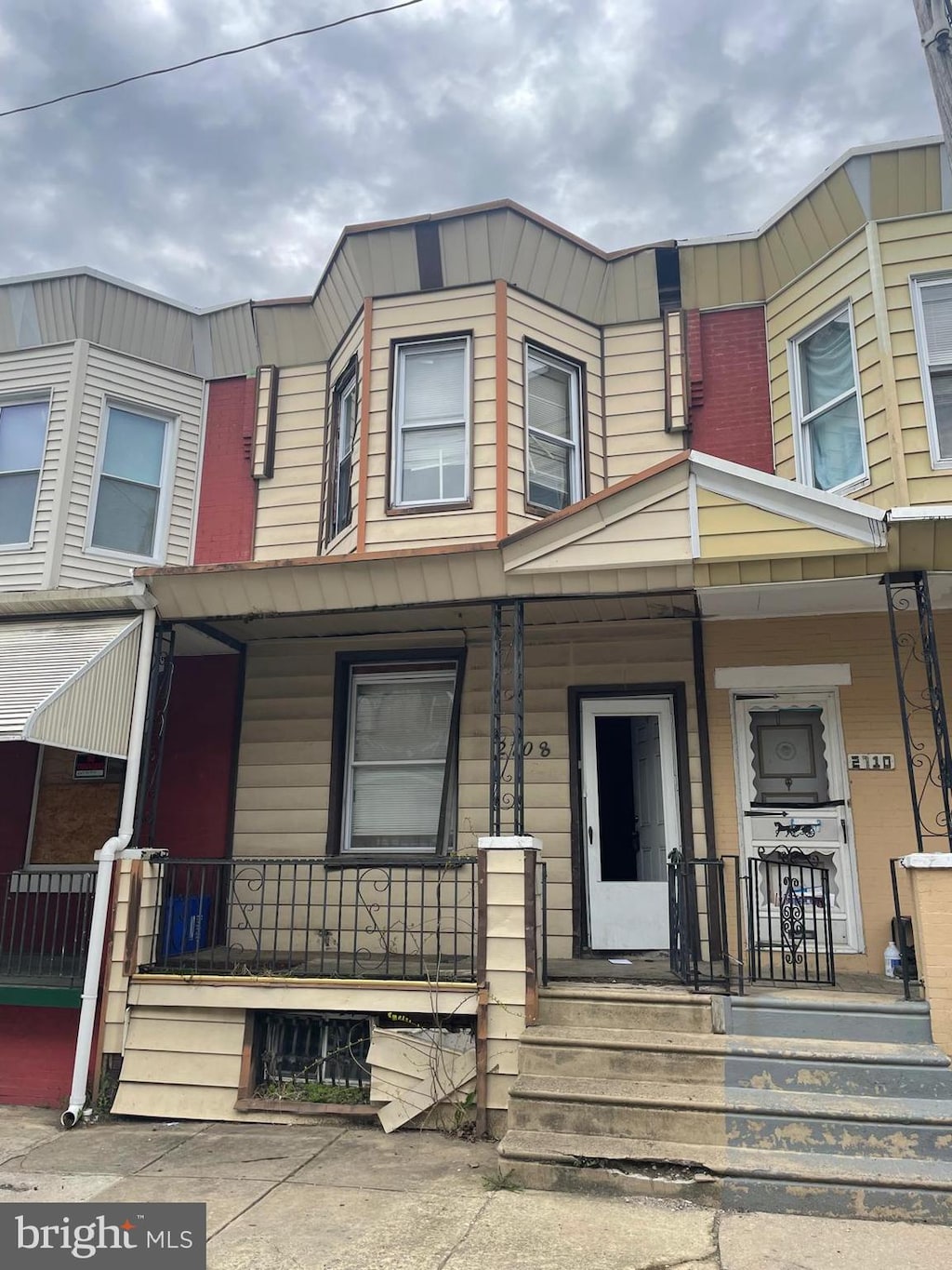2708 W Seltzer St, Philadelphia, PA 19132 - townhome / multi-family property featuring a porch