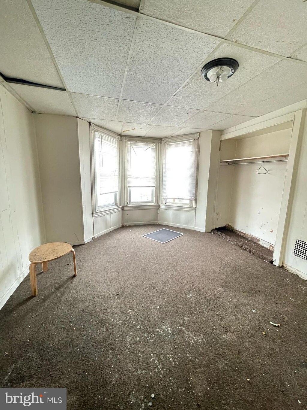 2708 W Seltzer St, Philadelphia, PA 19132 - unfurnished bedroom featuring carpet floors and a drop ceiling
