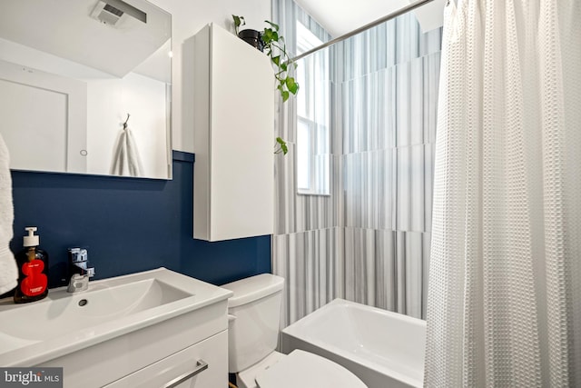 full bath featuring visible vents, a wealth of natural light, toilet, and vanity