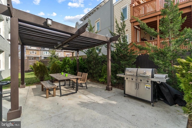 view of patio with a pergola and outdoor dining area