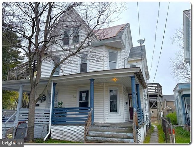 207 S 4th St, Millville, NJ 08332 - victorian-style house featuring a porch