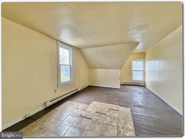 207 S 4th St, Millville, NJ 08332 - bonus room with a baseboard radiator, baseboards, vaulted ceiling, and baseboard heating