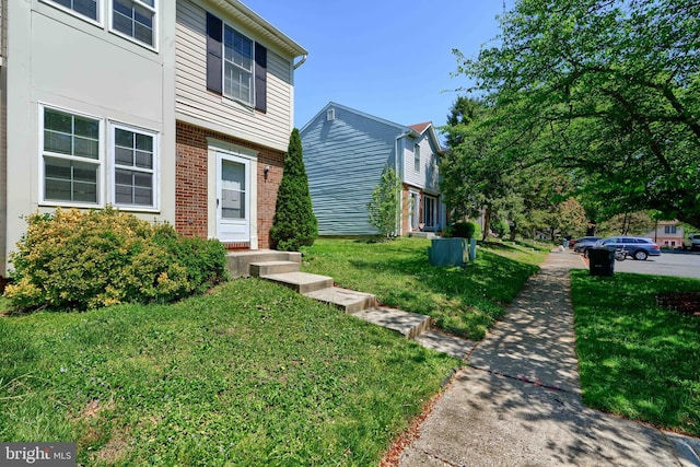 312 Talbot Ct, Abingdon, MD 21009 - view of front facade featuring brick siding and a front lawn
