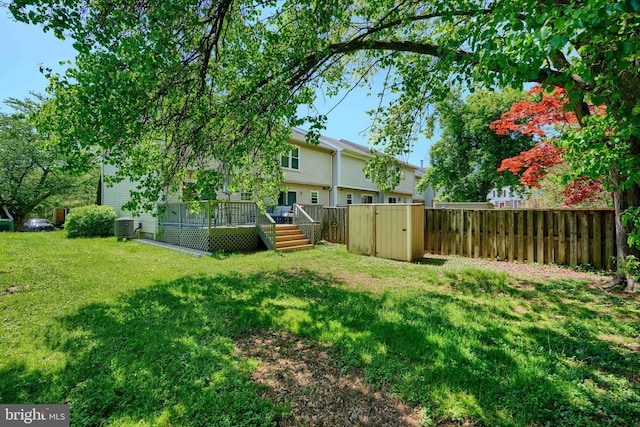 312 Talbot Ct, Abingdon, MD 21009 - view of yard featuring a storage unit, central AC, a wooden deck, a fenced backyard, and an outdoor structure