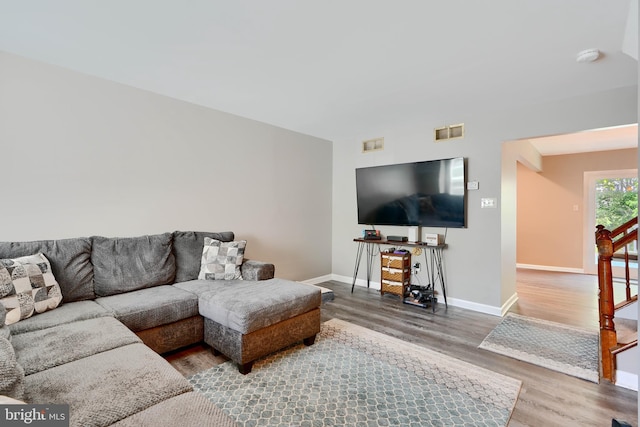 312 Talbot Ct, Abingdon, MD 21009 - living area with visible vents, baseboards, wood finished floors, and stairway