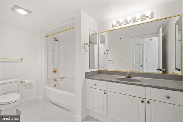 full bath featuring toilet, baseboards, vanity, and bathtub / shower combination