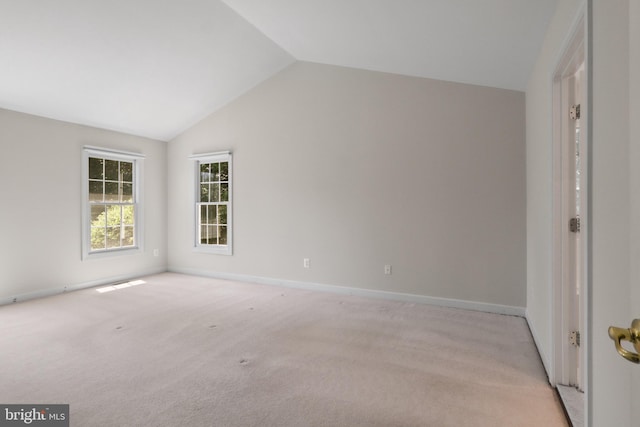 20461 Mcgees Ferry Way, Sterling, VA 20165 - unfurnished bedroom featuring vaulted ceiling, light colored carpet, and baseboards
