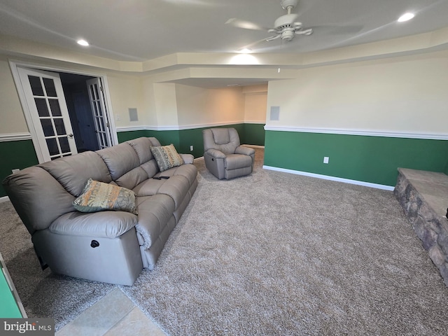 carpeted living room with ceiling fan, baseboards, and recessed lighting